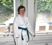 Taekwondo-Sportlerin C. Karwacki als Co-Trainerin